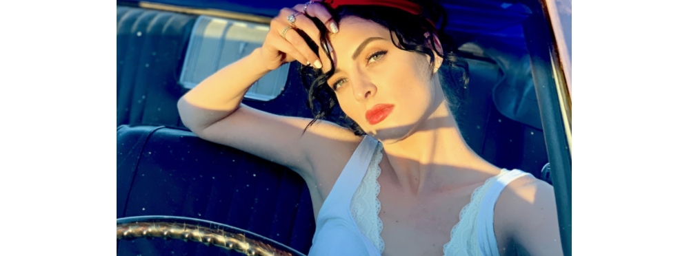 Iowa born and raised Ellie Rivers is putting her own twist on Country Music
