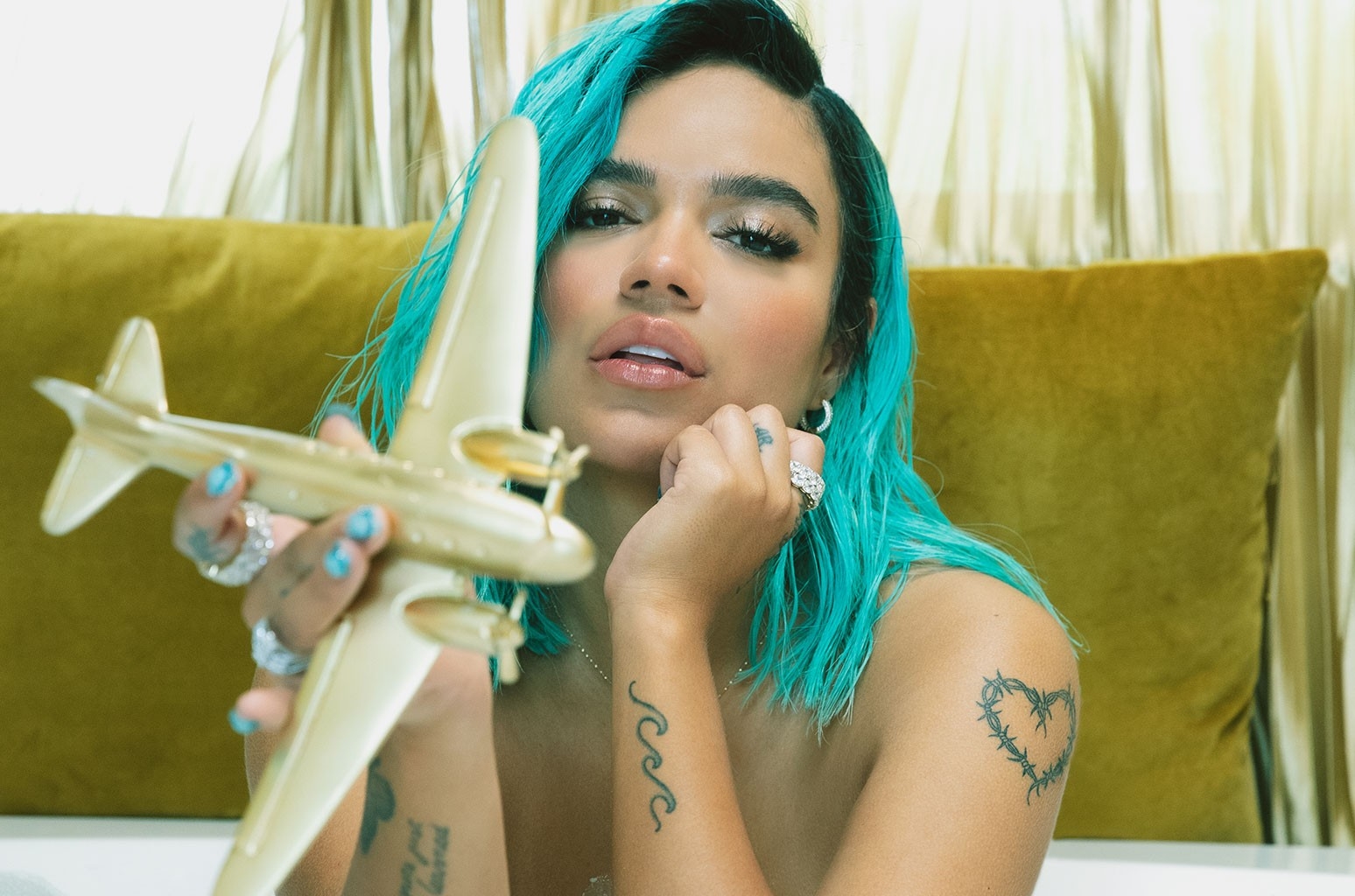 Watch Karol G Get Inked With Friends in 200 Copas Video