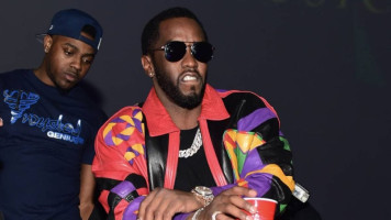 DIDDY CELEBRATES DAUGHTER LOVE COMBS' 1ST BIRTHDAY WITH DANA TRAN