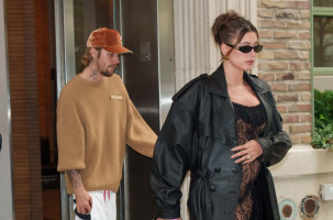 Hailey Bieber Shows Off Baby Bump in Lace Jumpsuit While Heading to NYC Dinner With Justin Bieber
