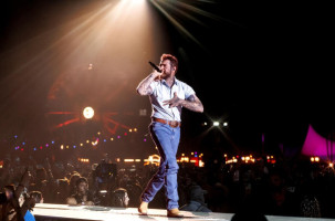 Post Malone Falls Off Stage Mid-Toast During Arizona Show
